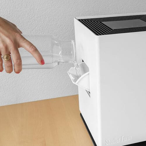 Reumplerea apei din lateral în timpul funcționării