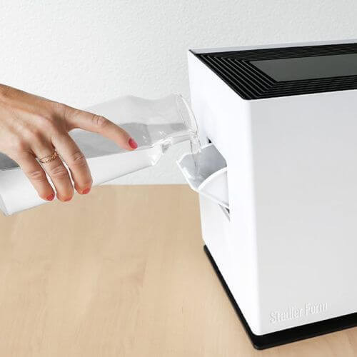 Reumplerea apei din lateral în timpul funcționării